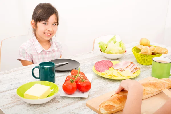 Daughter eating at home — Stock Photo, Image