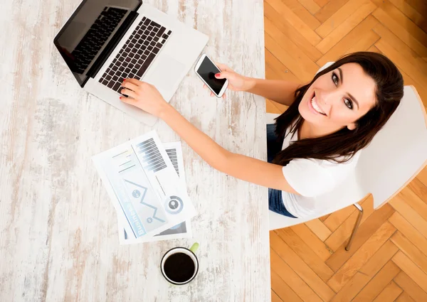 Young business woman working from home — Stock Photo, Image