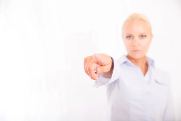 Blond meisje wijzende vinger — Stockfoto