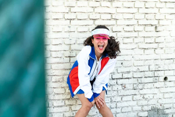 Young woman wearing vintage sporty outfits — Stock Photo, Image