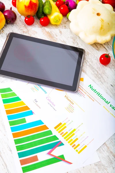 Nutrizione sana e tablet — Foto Stock