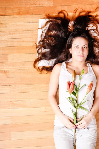 Young woman with lily — Stock Photo, Image