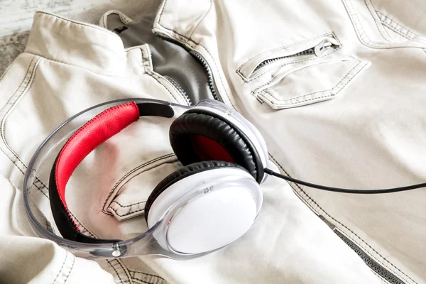 Headphones on a white Jacket — Stock Photo, Image