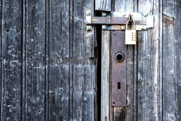 A locked wooden door — Stock Photo, Image