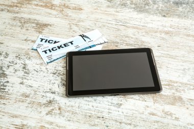 Buy Cinema Tickets online with a Tablet PC	 clipart