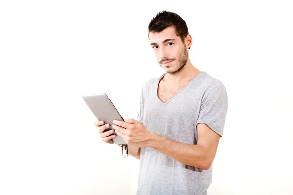 Hombre joven usando tableta —  Fotos de Stock