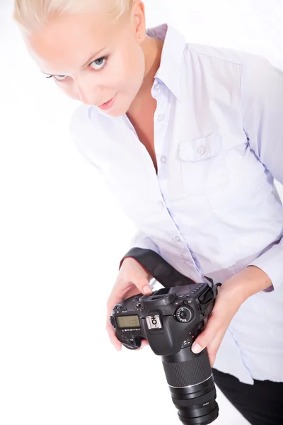 Blond girl with camera — Stock Photo, Image