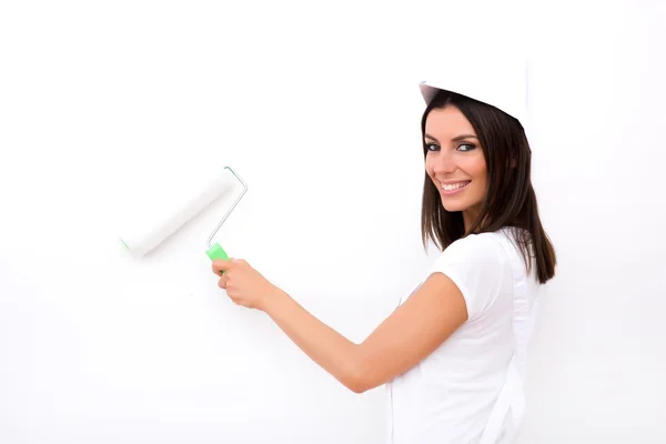 Beautiful young woman painting a Apartment — Stock Photo, Image