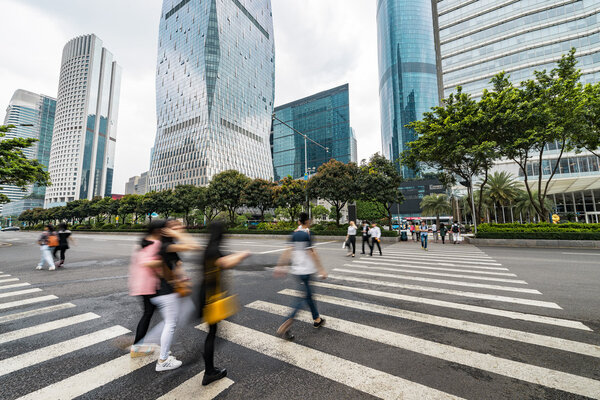 Pedestrians on the road of city