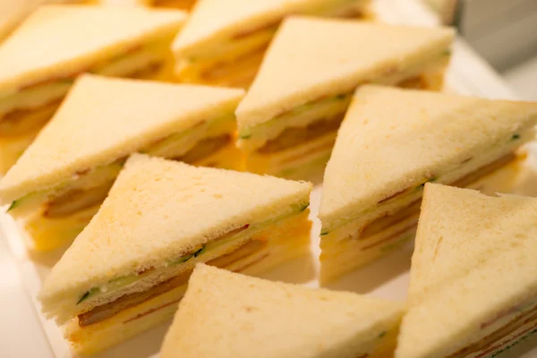 Sandwich in the cake shop shelves