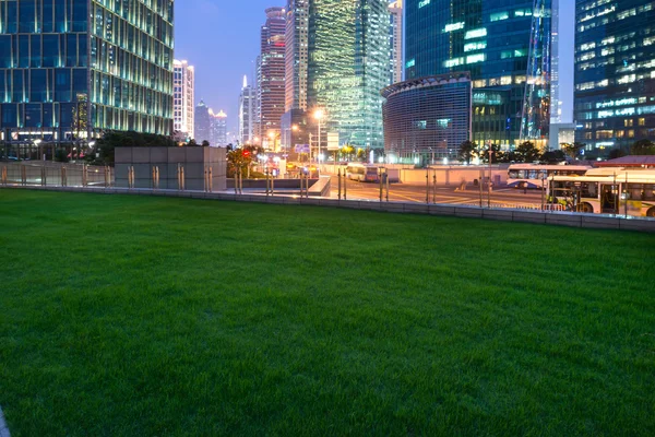Lawn and city — Stock Photo, Image