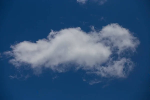 Blue Sky and puffy clouds