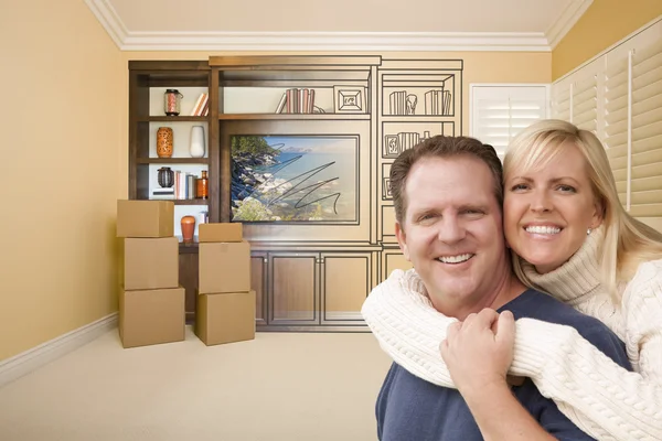 Young Couple In Room With Drawing of Entertainment Unit On Wall — Stock Photo, Image