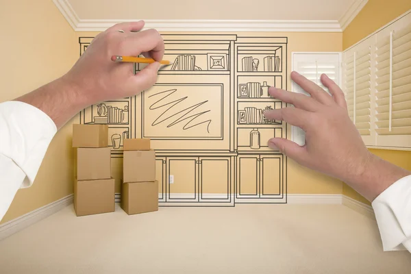 Hands Drawing Entertainment Unit In Room With Moving Boxes — Stock Photo, Image