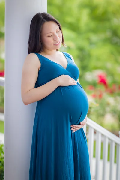 Portrait of Young Pregnant Chinese Woman on the Front Porch — Stock Photo, Image