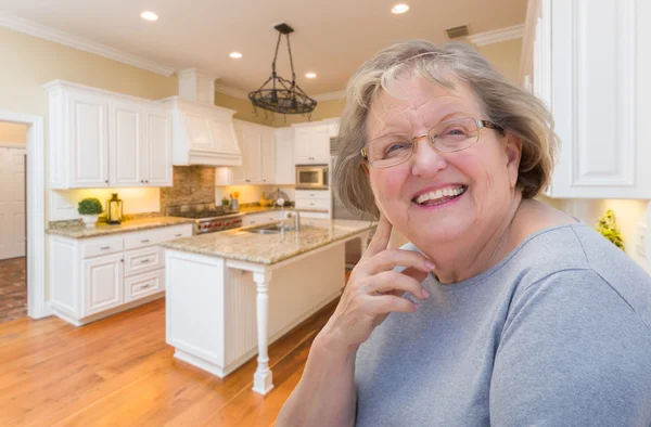 Happy Senior Woman In Custom Kitchen Interior — Stock Photo, Image