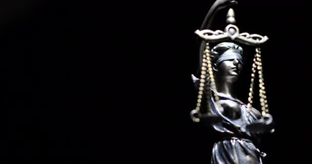 Spot Lit Lady Justice Statue Slowly Rotating Black Background — Stock Video