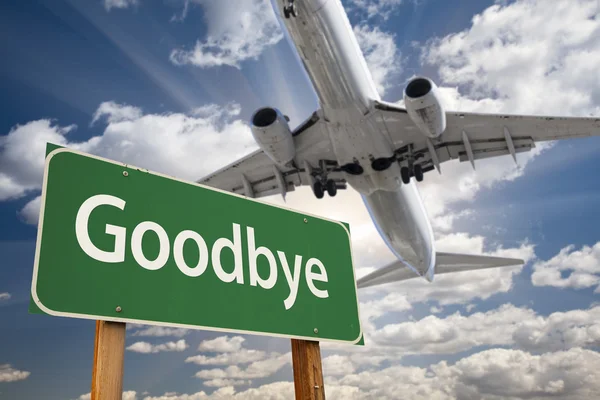 Goodbye Green Road Sign and Airplane Above — Stock Photo, Image