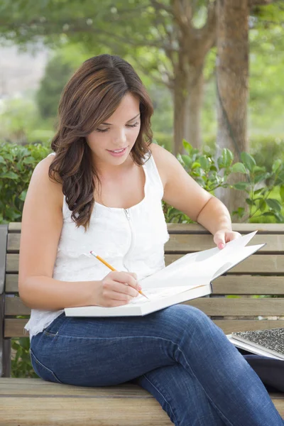 Young Adult Female Student on Bench Outdoors — Stock Photo, Image