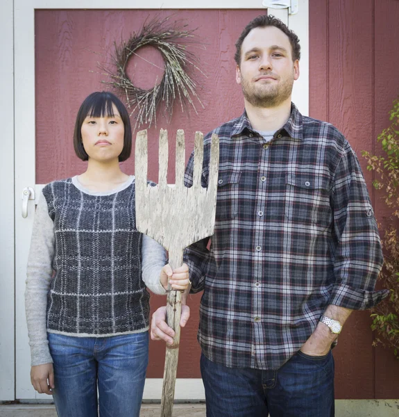 Fun Mixed Race Couple Portrait Simulating the American Gothic Pa — Stock Photo, Image