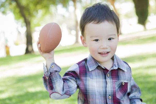 Cute Young Mixed Race Boy Playing Football Outside — Stock Photo, Image