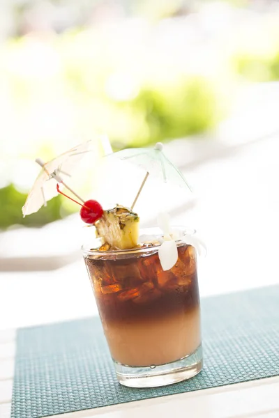 Ice Cold Mai Tai Cocktail Drink with Fruit and Umbrullas — Stock Photo, Image