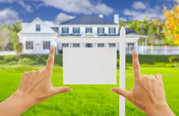 Hands Framing Blank Real Estate Sign and New House — Stock Photo, Image