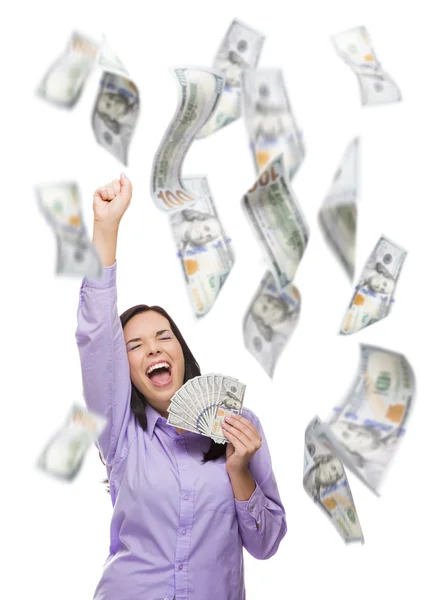 Mulher feliz segurando milhares de dólares com muitos outros caindo em torno dela — Fotografia de Stock