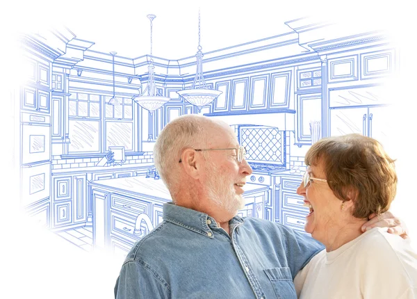 Senior Couple Over Custom Kitchen Design Drawing on White — Stock Photo, Image