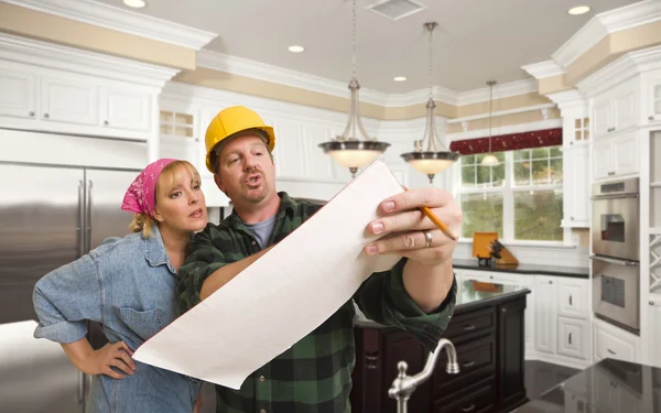 Contractor Discussing Plans with Woman Inside Custom Kitchen Int — Stock Photo, Image