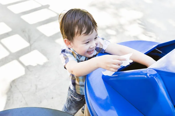 Cute Mixed Race Boy Placing Paper Into Recycle Bin — Stock Photo, Image