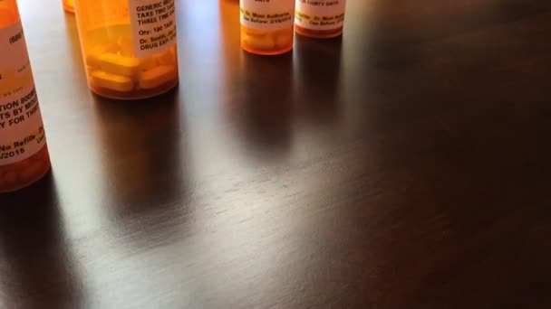 Slow Motion Medicine Bottles and Pills Falling — Stock Video