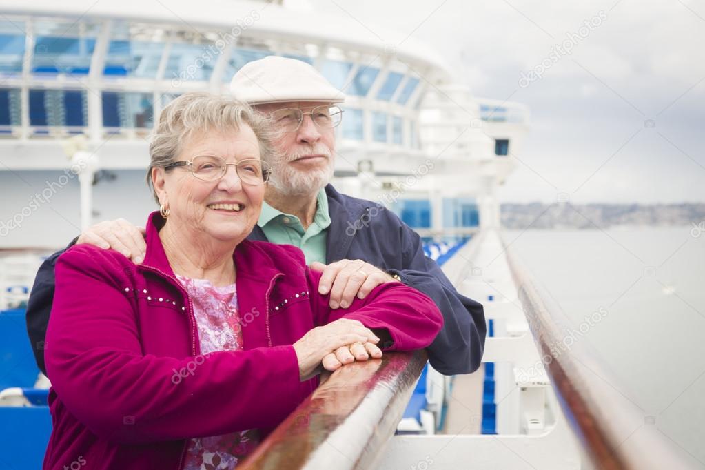 Senior Couple Enjoying The Deck of a Cruise Ship