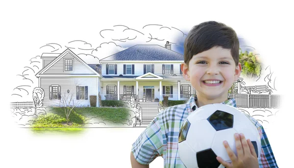 Ragazzo che tiene il pallone da calcio davanti alla foto schizzo della casa — Foto Stock