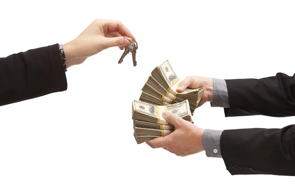 Handing Over Thousands of Dollars for House Keys on White — Stock Photo, Image