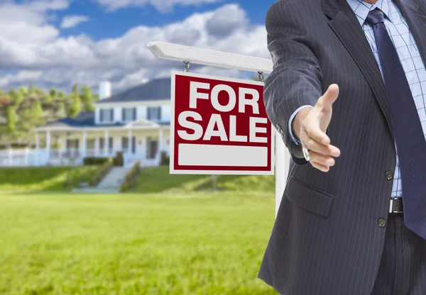 Agent Reaches for Handshake, Sale Sign and House Behind — Stock Photo, Image