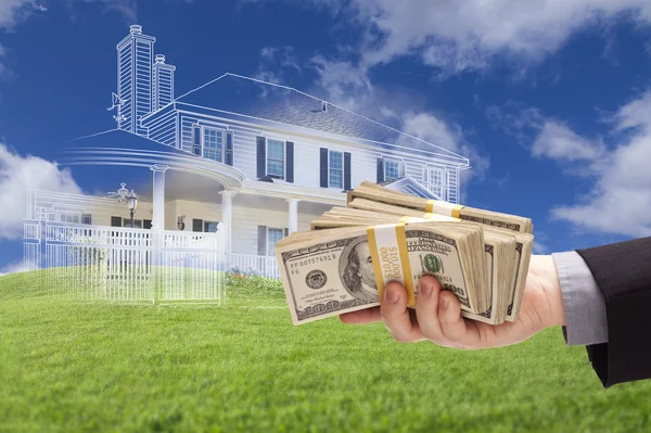 Handing Over Thousands of Dollars with Ghosted House Drawing Beh — Stock Photo, Image