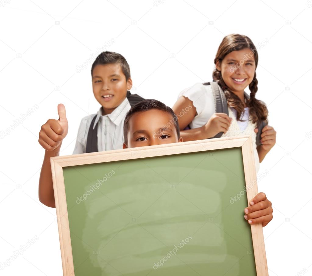 Students with Thumbs Up Holding Blank Chalk Board on White