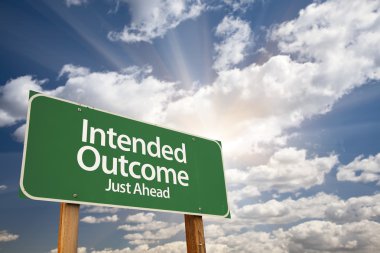 Intended Outcome Green Road Sign Over Clouds clipart