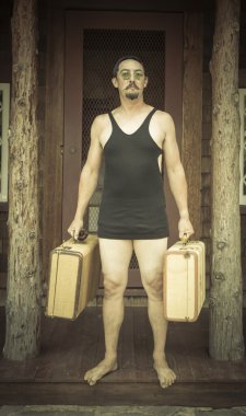 Gentleman Dressed in 1920s Era Swimsuit Holding Suitcases on clipart