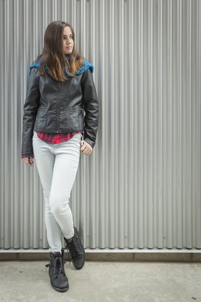 Young Teen Girl Standing Against Metal Wall — Stock Photo, Image
