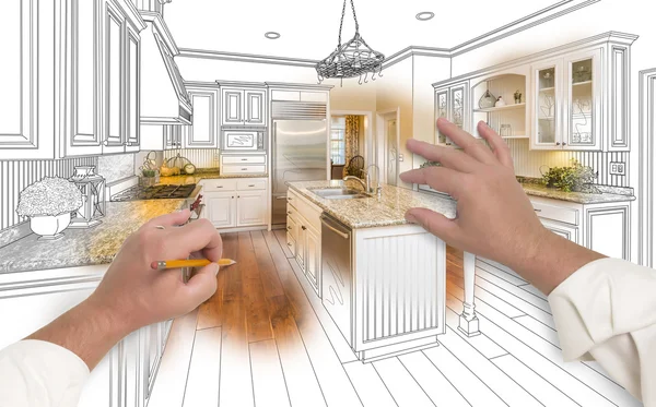 Mãos masculinas esboçando cozinha personalizada com foto mostrando através — Fotografia de Stock