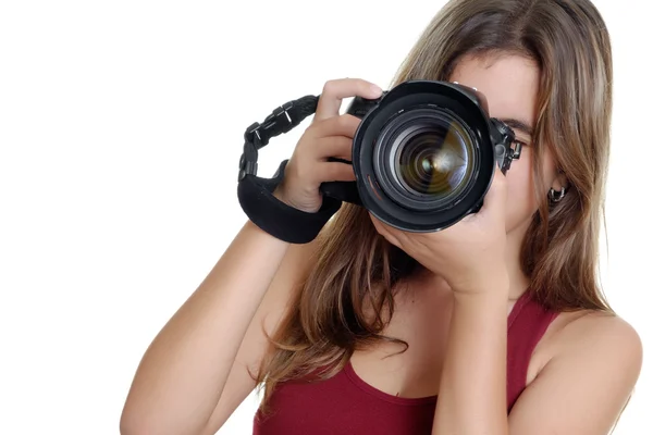 Teenager taking photographs with a professional camera — Stock Photo, Image