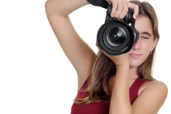 Teenager taking photographs with a professional camera — Stock Photo, Image