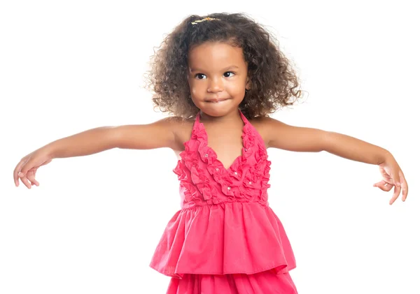 Chica Lttle con un peinado afro riendo con los brazos extendidos —  Fotos de Stock