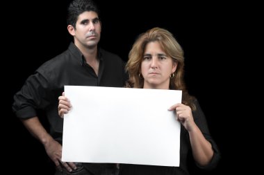Woman and man holding white banner clipart