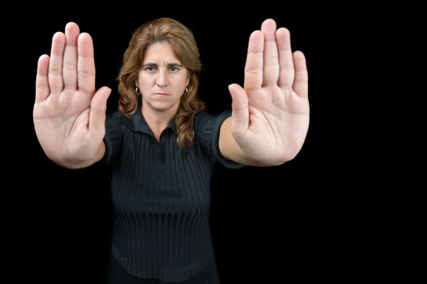 Mujer seria haciendo un gesto para parar — Foto de Stock