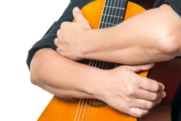 Arms hugging  guitar — Stock Photo, Image