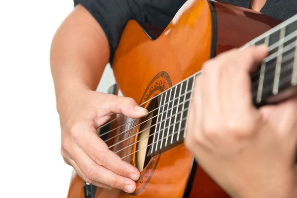 Female hands playing  guitar Royalty Free Stock Photos