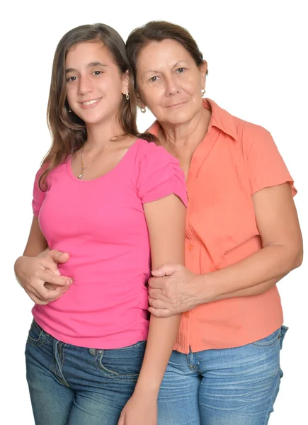 Hispanic teenage girl and her grandmother isolated on white — Stock Photo, Image
